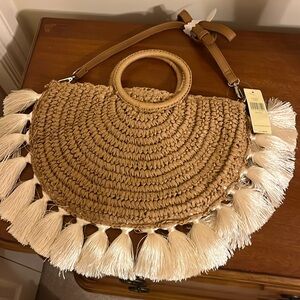 Straw natural colored handbag. New. Spacious. Hand strap and shoulder strap.
